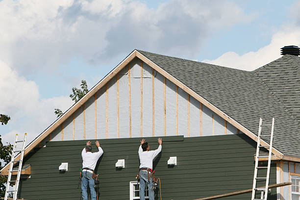 Professional Siding Replacement technician working in Barclay, MD